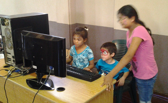 LUGM: Educational workstation running GCompris suite attracted the youngest attendees of the day. Of course, face painting had to be done prior to hacking...